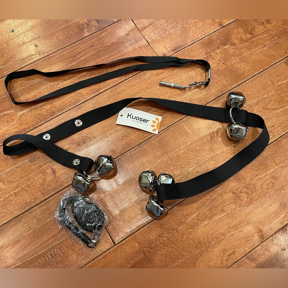 Dog training set.  Clicker, whistle and bells for door.